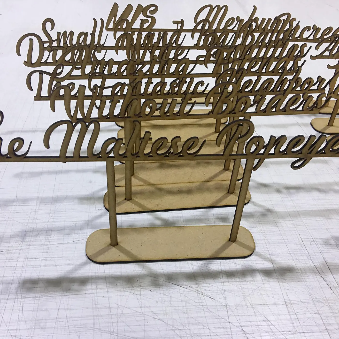 Laser-cut wooden names